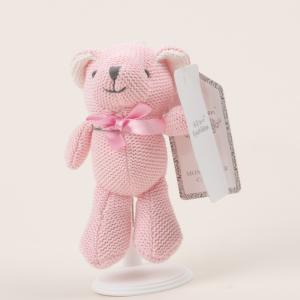 Knitted teddy bear with yarn